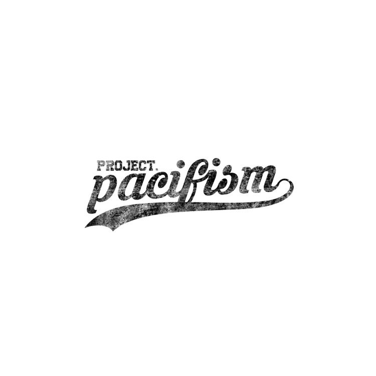 Project Pacifism tag — appears on the hoodie's inner neck tag above the size